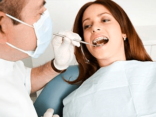 Clínica Dental Remei Gomà dentista y paciente